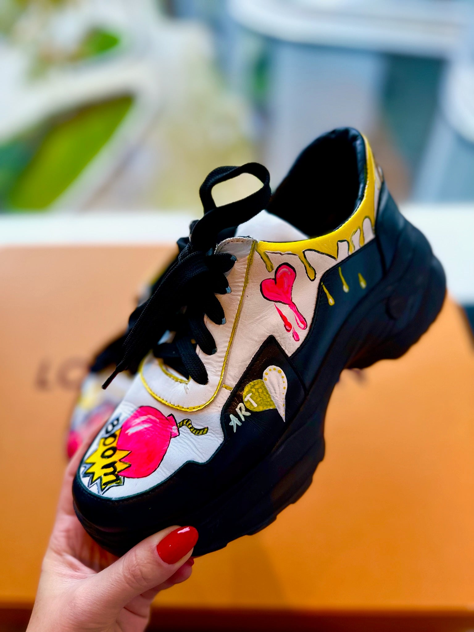 Close up custom painted sneaker details artwork